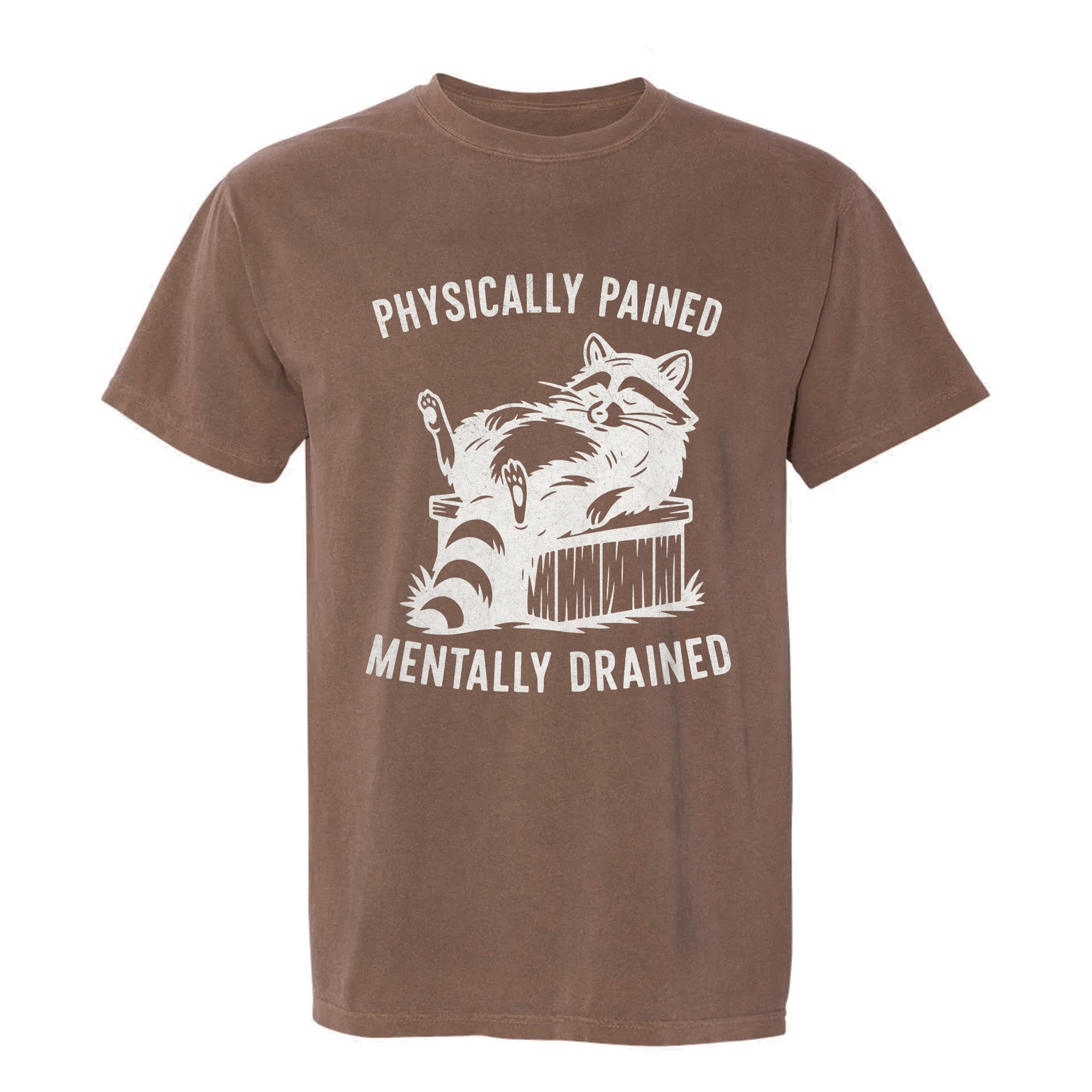 Brown funny graphic t-shirt with a raccoon graphic and text "Physically Pained Mentally Drained".