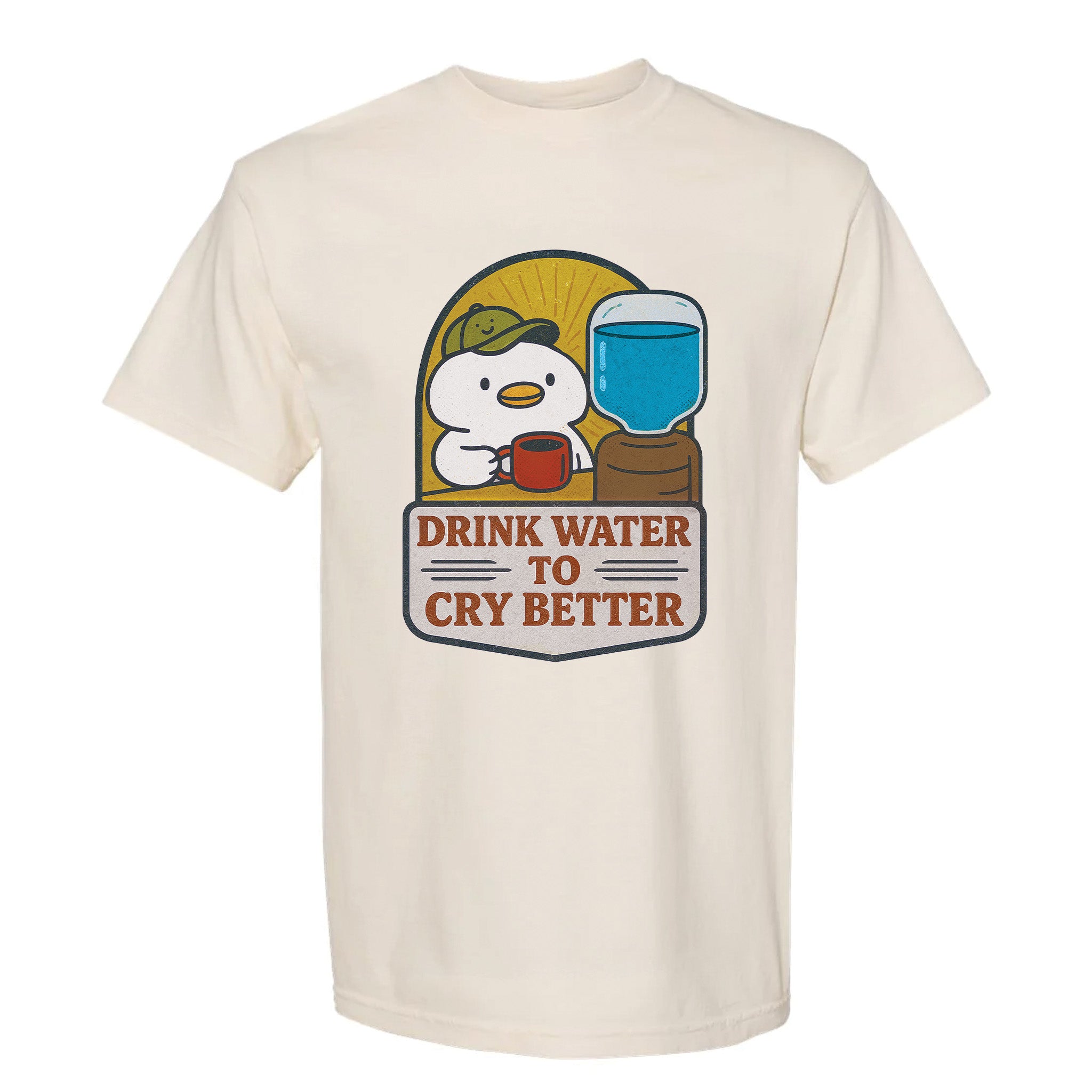 Beige funny graphic t-shirt with a graphic of a cartoon character, glass of water, and text "Drink Water to Cry Better".