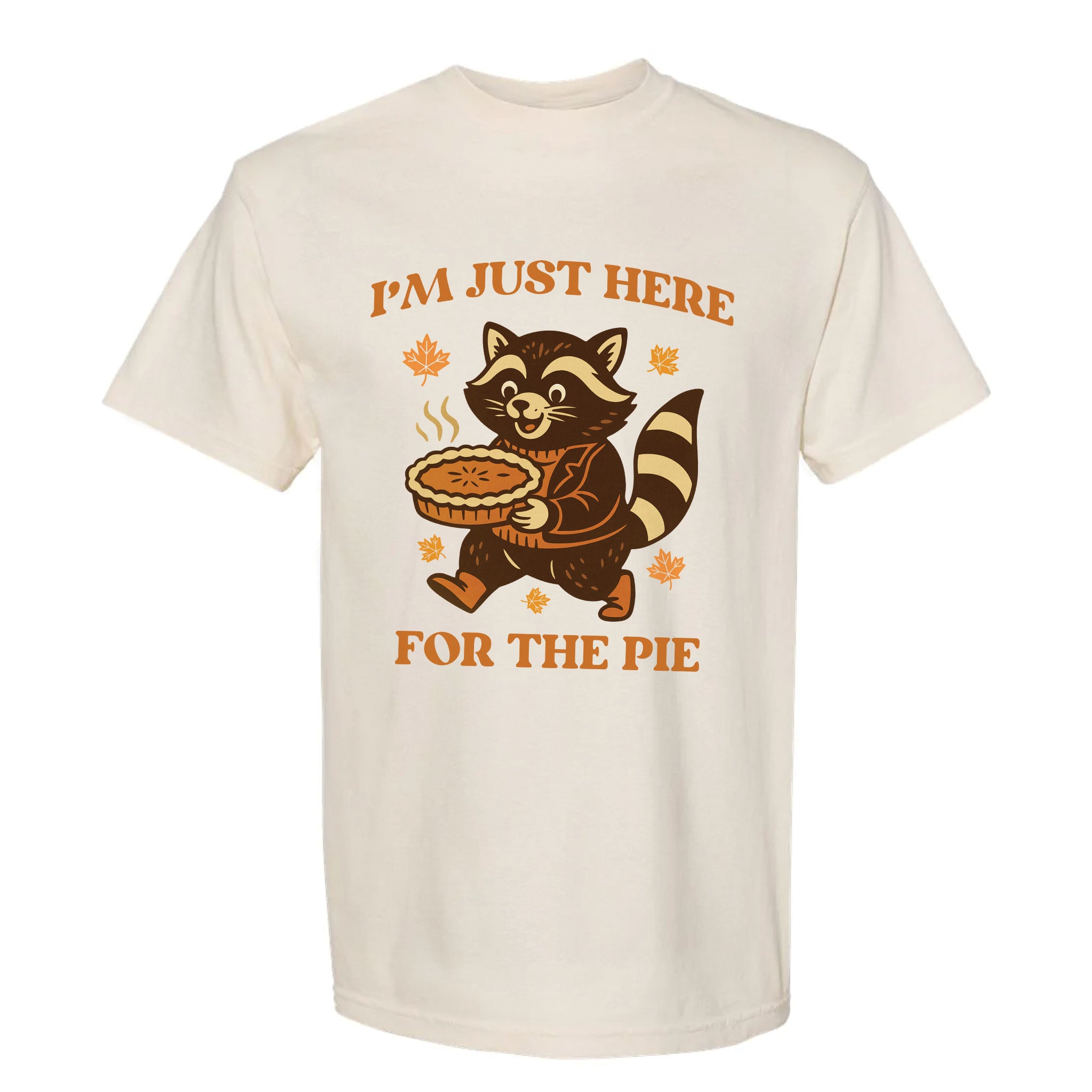 Beige Thanksgiving t-shirt with a raccoon holding a pie graphic and text 'I'm just here for the pie'