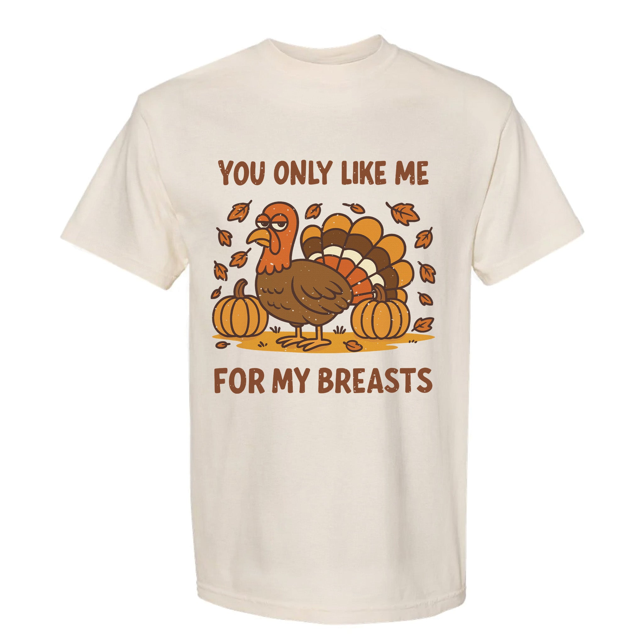 Beige Thanksgiving t-shirt with a turkey graphic and text 'You only like me for my breasts'