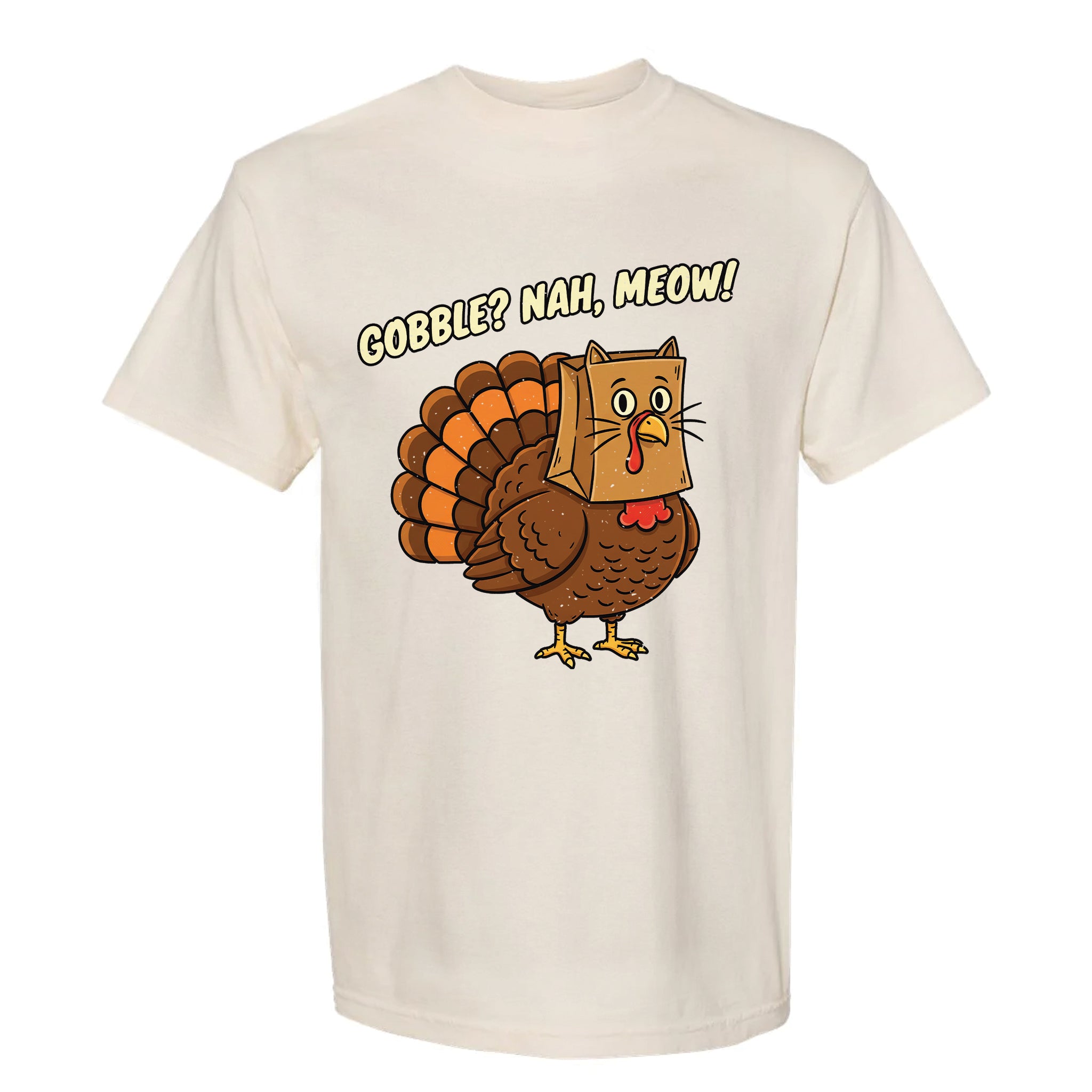 Beige Thanksgiving t-shirt with a cartoon turkey wearing a cat mask and text 'Gobble? Nah, Meow!'