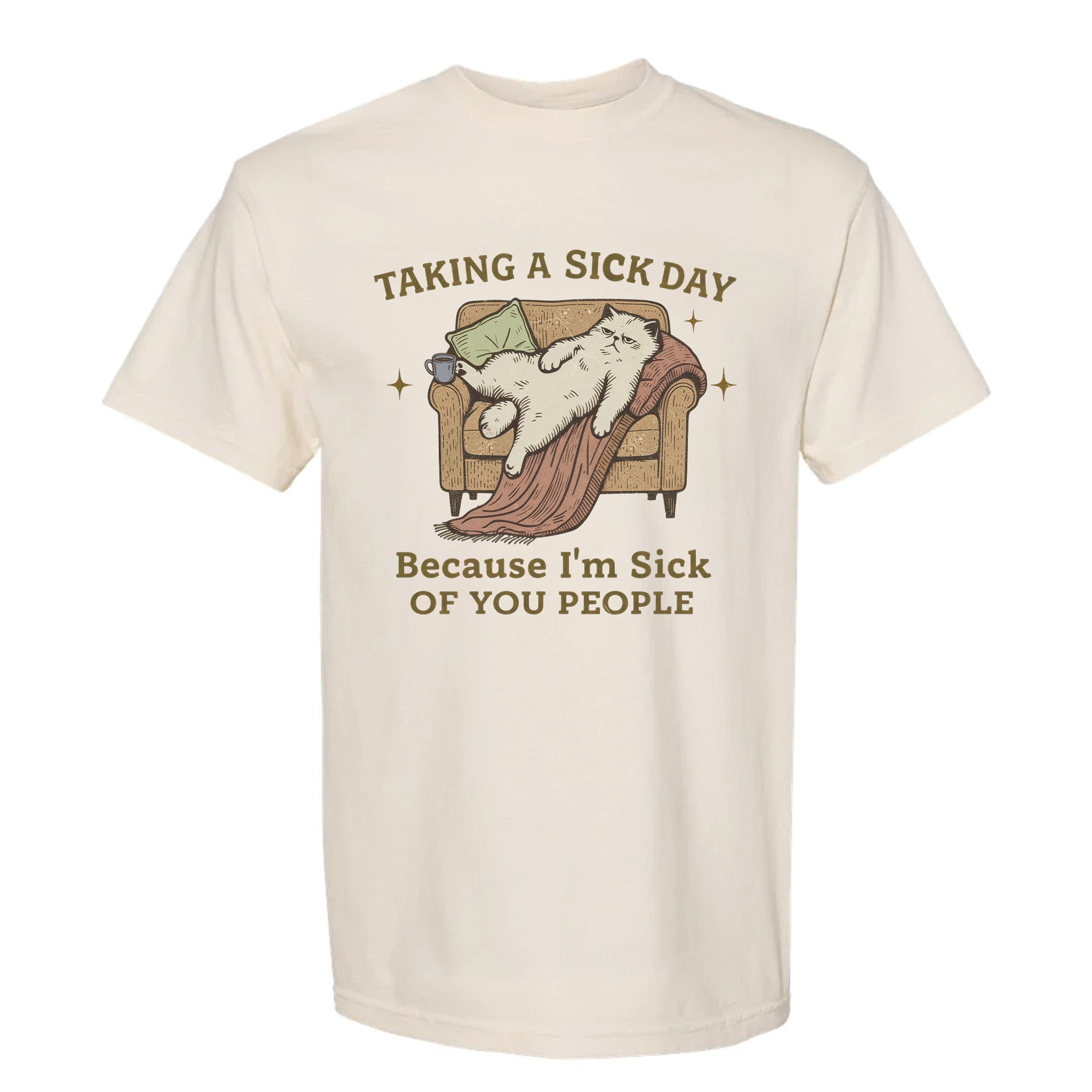 Beige funny t-shirt with a graphic of a cat on an armchair and humorous text 'Taking A Sick Day, Because I'm Sick Of You People'