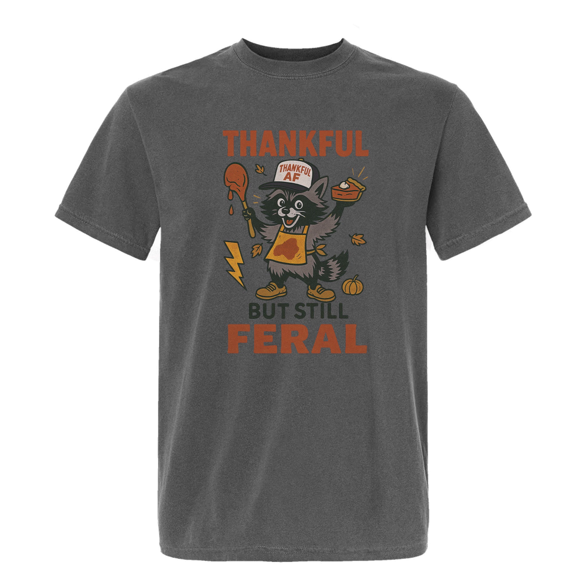 Gray Thanksgiving graphic t-shirt with text 'Thankful but still feral' on a white background.