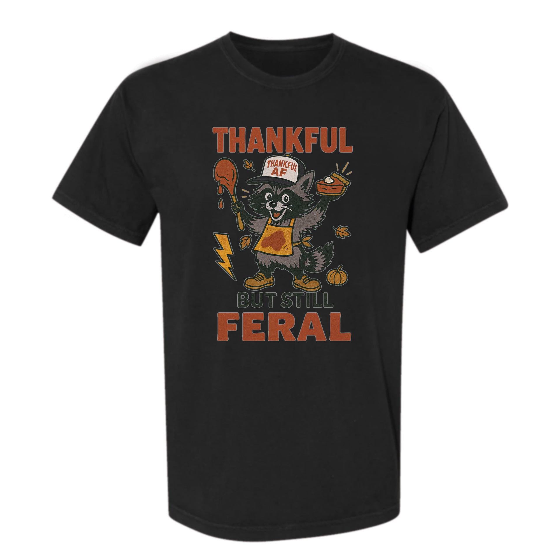 Black Thanksgiving graphic t-shirt with text 'Thankful but still feral' on a white background.