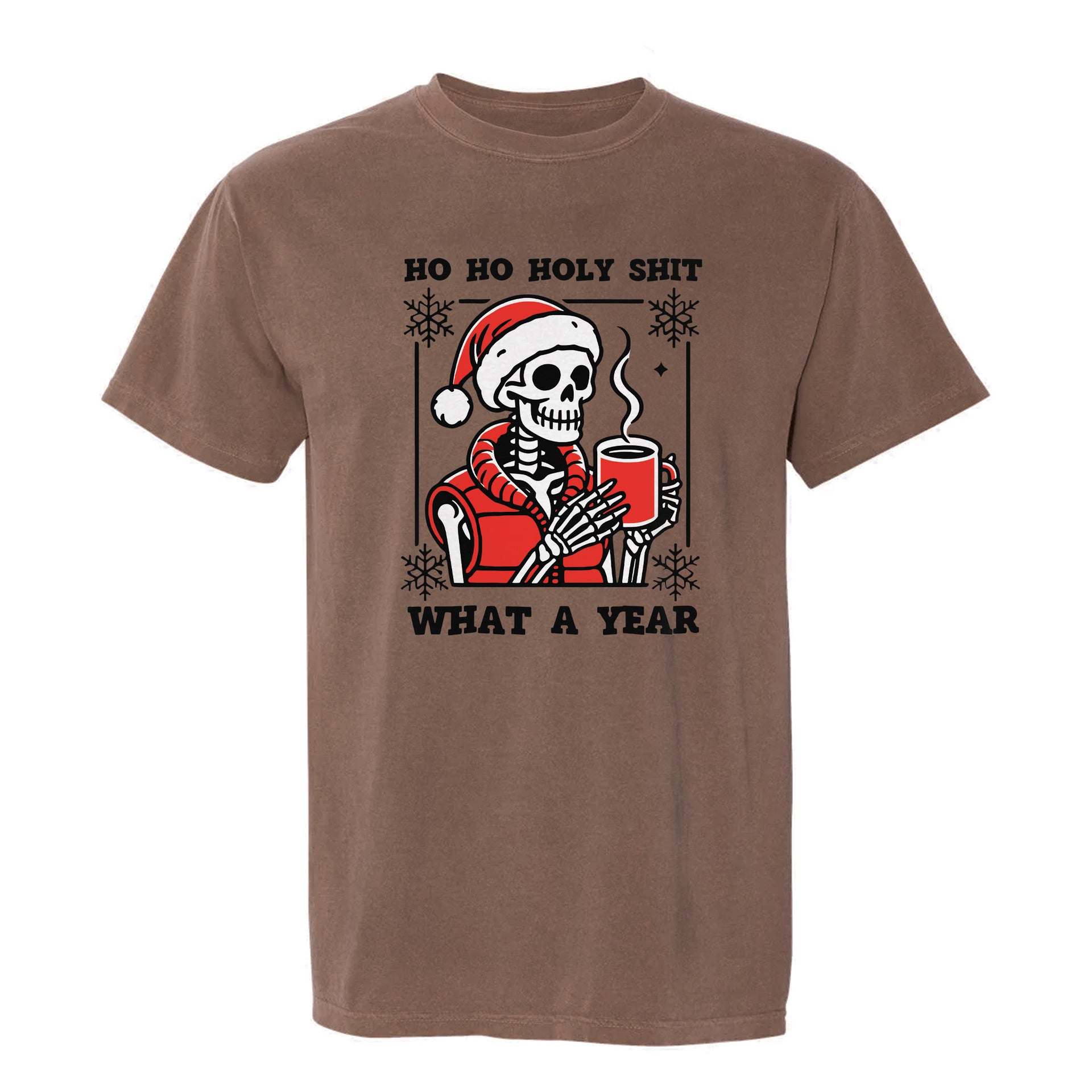 Brown Christmas graphic t-shirt with a skeleton in a Santa hat drinking from a mug and text ‘Ho Ho Holy Shit What a Year’.