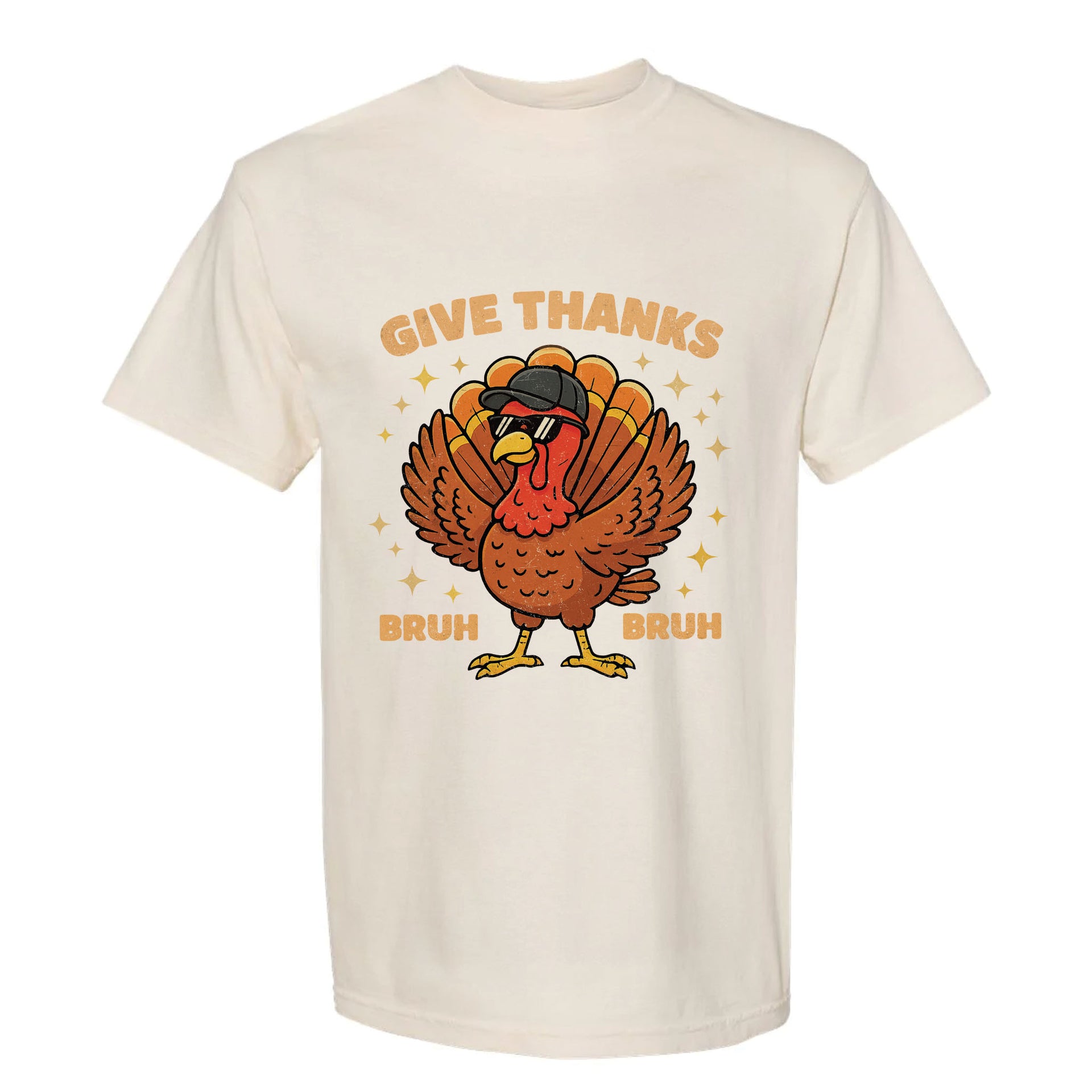 Beige Thanksgiving graphic t-shirt with a turkey graphic and text 'Give Thanks Bruh Bruh'.