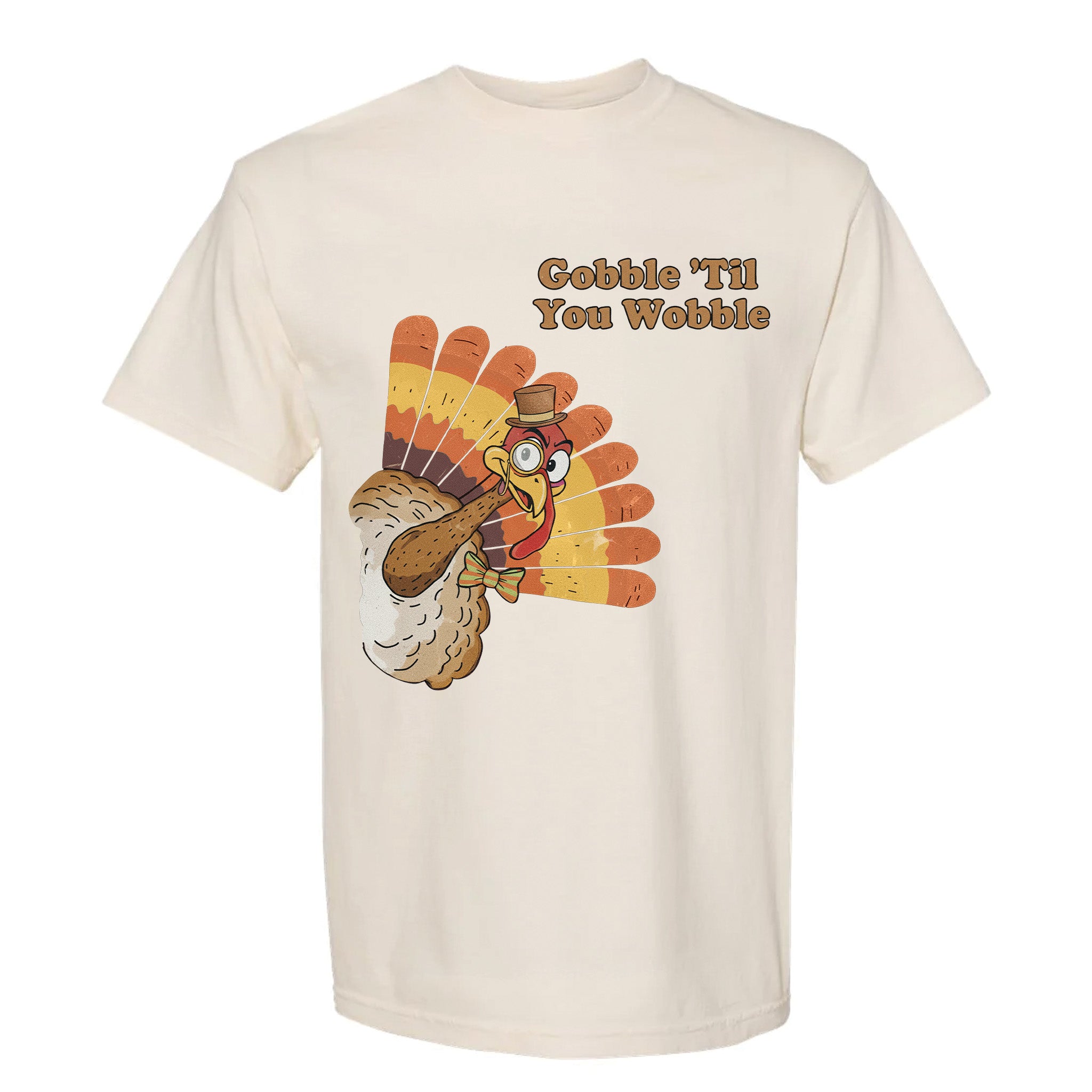 Beige Thanksgiving graphic t-shirt with a cartoon turkey and text 'Gobble 'Til You Wobble'.