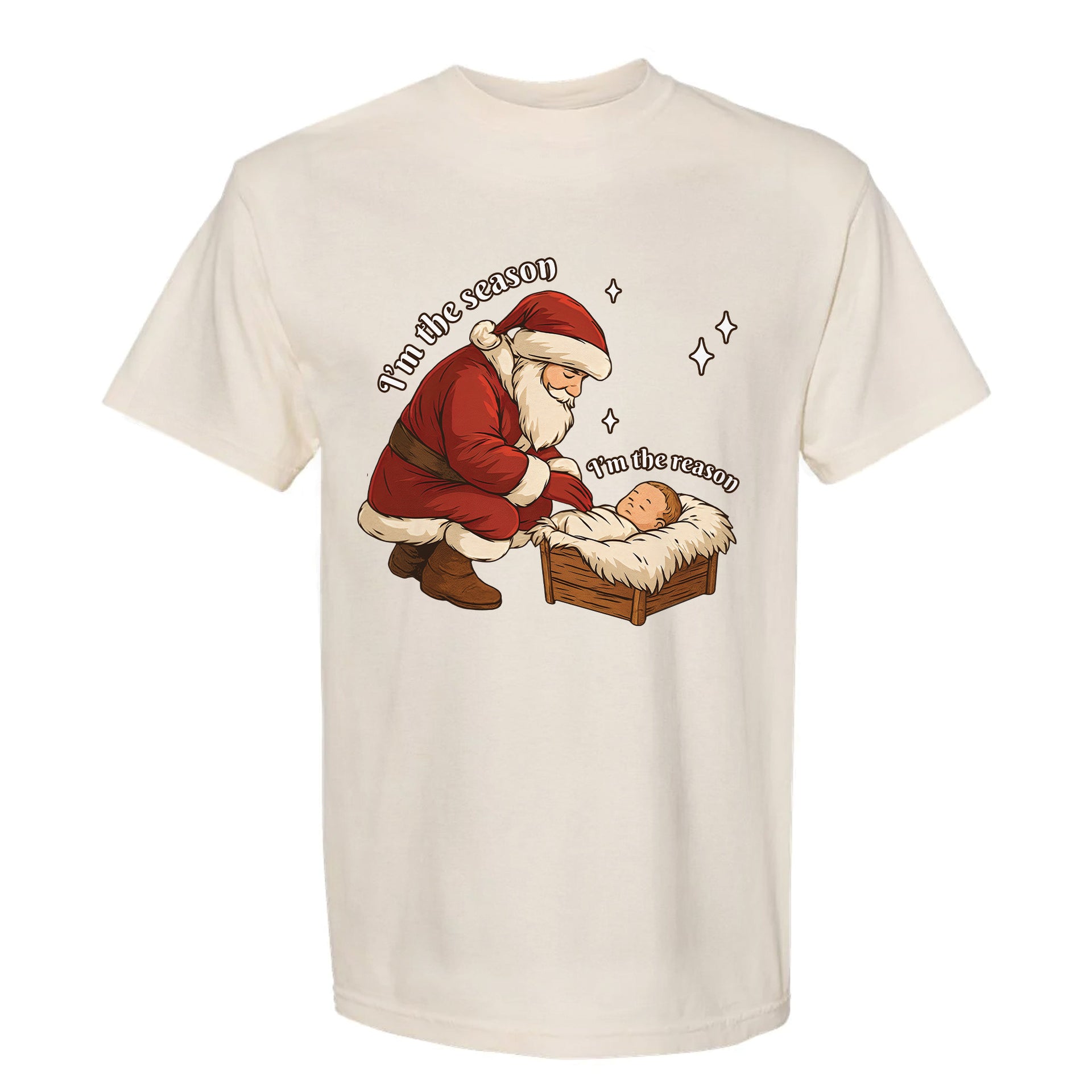 Beige Christmas graphic t-shirt with Santa, baby and text 'I'm The Season I'm The Reason'