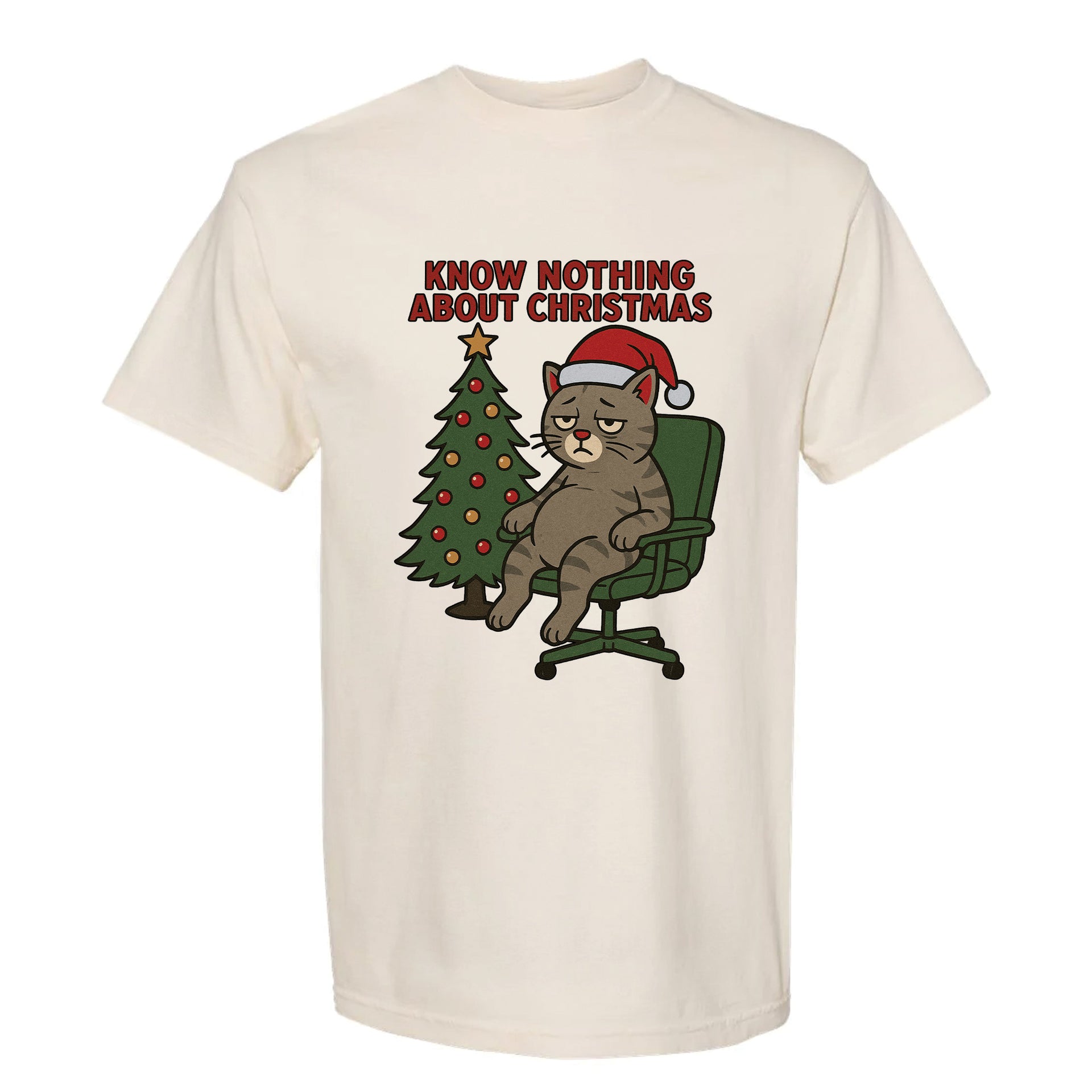 Beige Christmas graphic t-shirt with a cat sitting on a Christmas tree and text ‘Know Nothing About Christmas’.