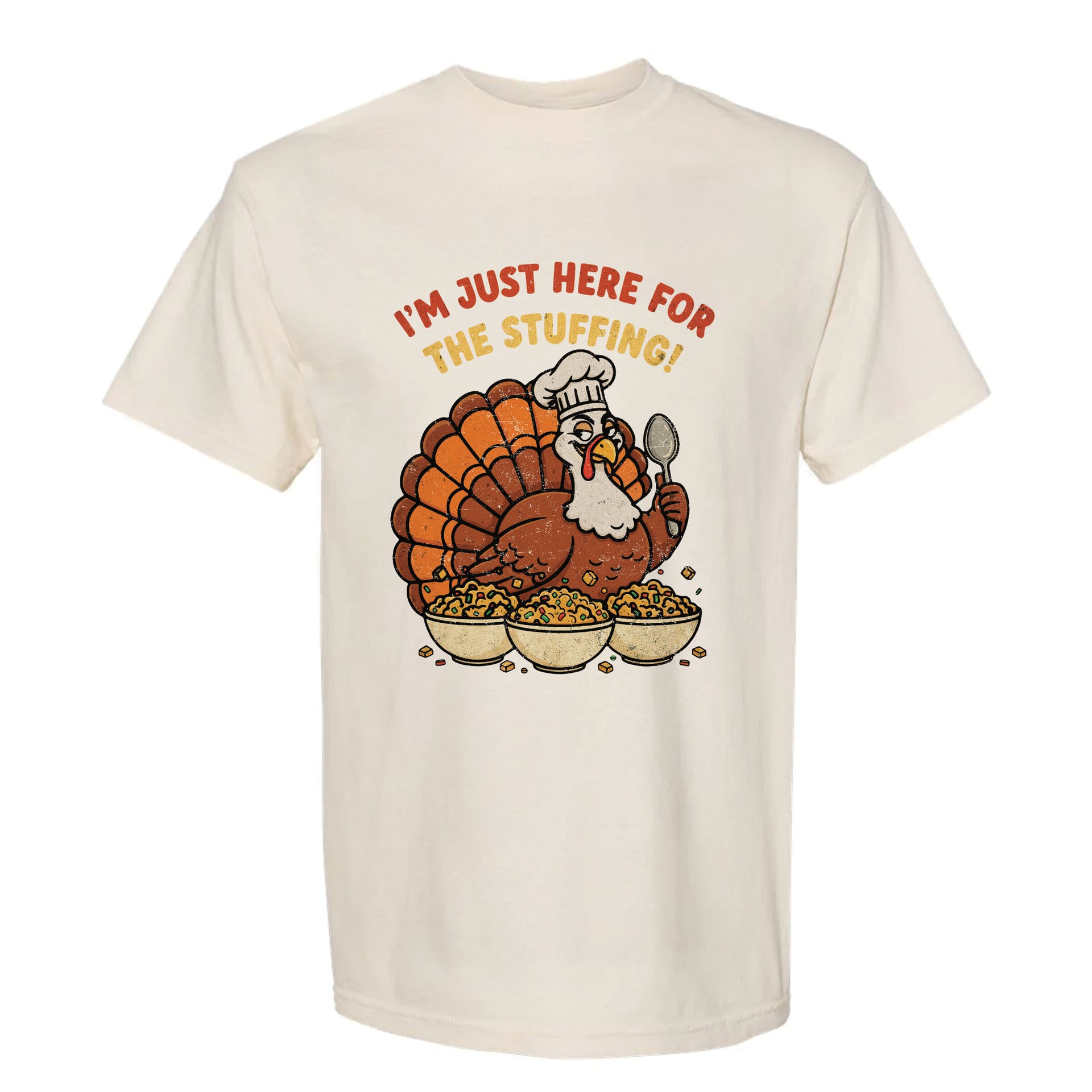 Beige Thanksgiving t-shirt with a cartoon turkey graphic and text 'I'm Just Here For The Stuffing!'
