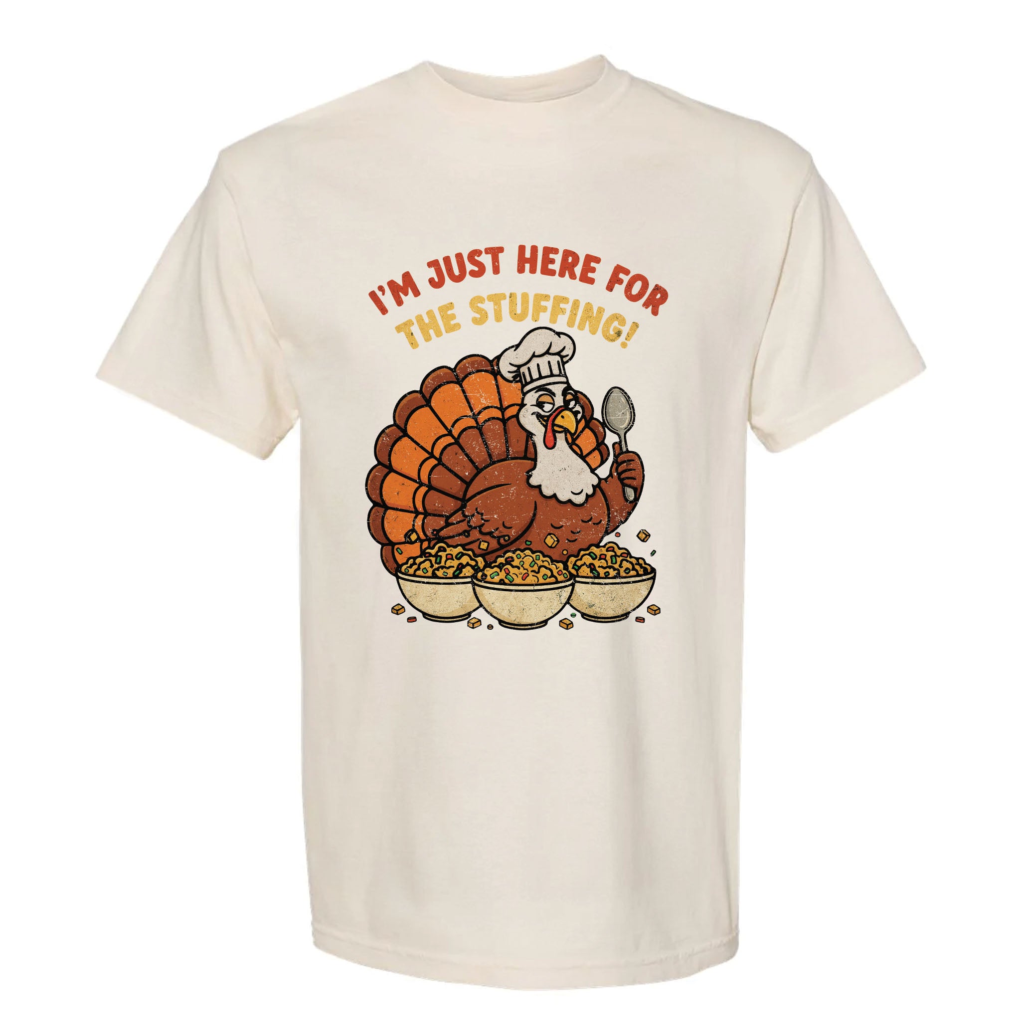 Beige Thanksgiving t-shirt with a cartoon turkey graphic and text 'I'm Just Here For The Stuffing!'
