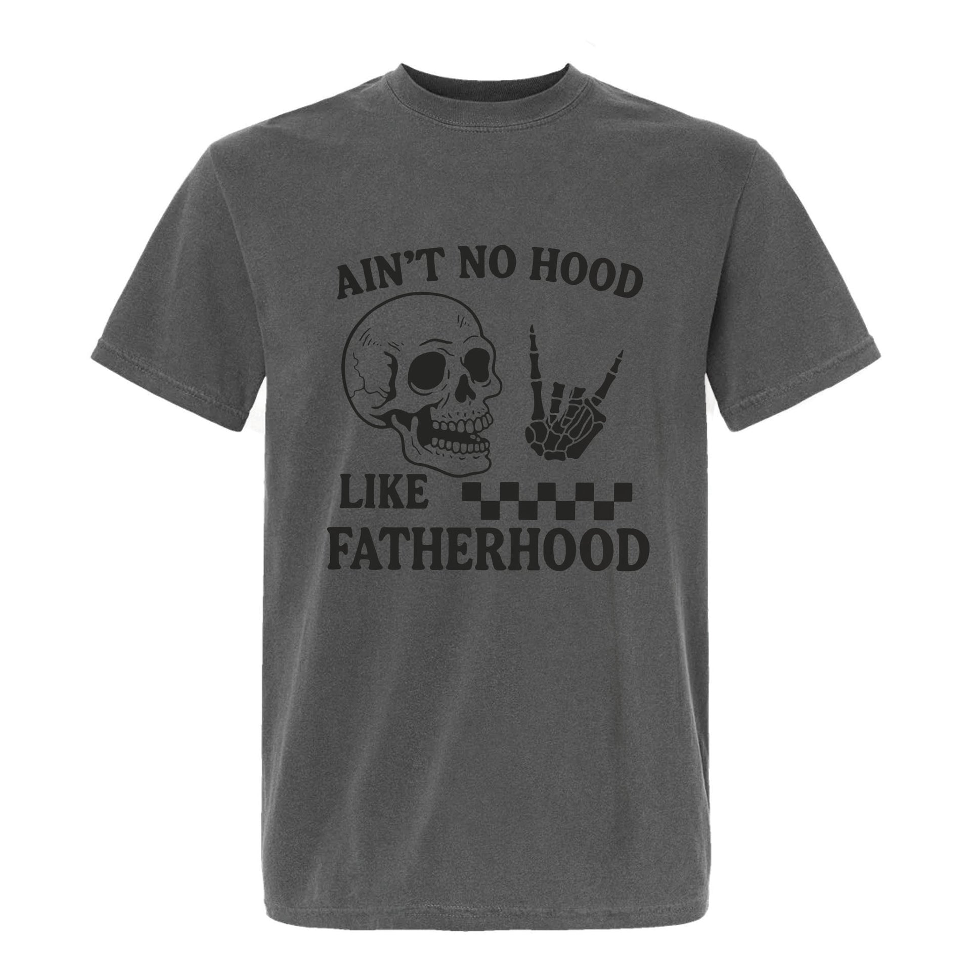 Grey funny graphic t-shirt with a skull, skeleton hand rock sign, and text: “AIN'T NO HOOD LIKE FATHERHOOD.”